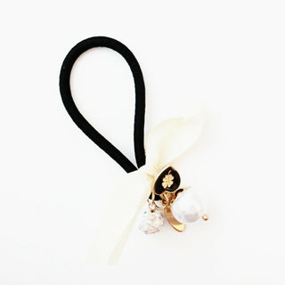 Hårstrikk med charms